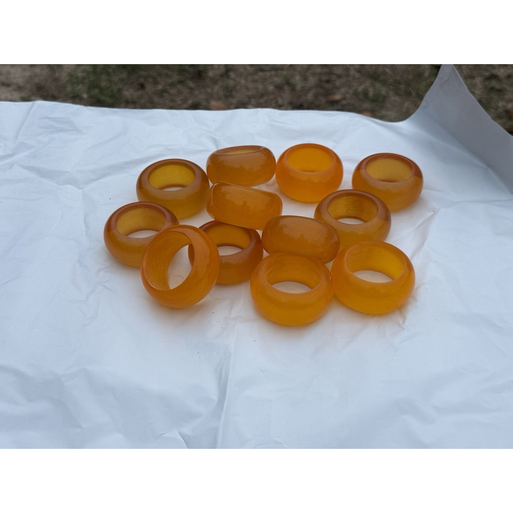 12 Butterscotch Lucite or Resin Swirl Napkin Rings Vintage Yellow Orange Chunky